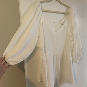 Flowy 3/4 length sleeve top with button detail from Chic Soul